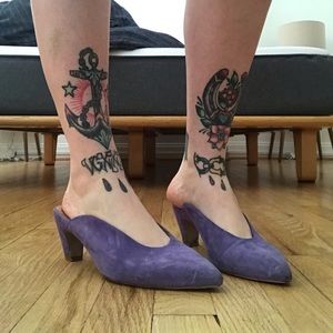 Intentionally ________. Suede kitten heeled mule.